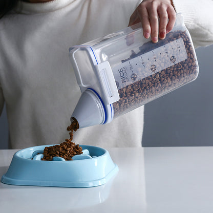 pet food storage box for storing pet food in a secure way. It comes with a cup for measuring the quantity of food